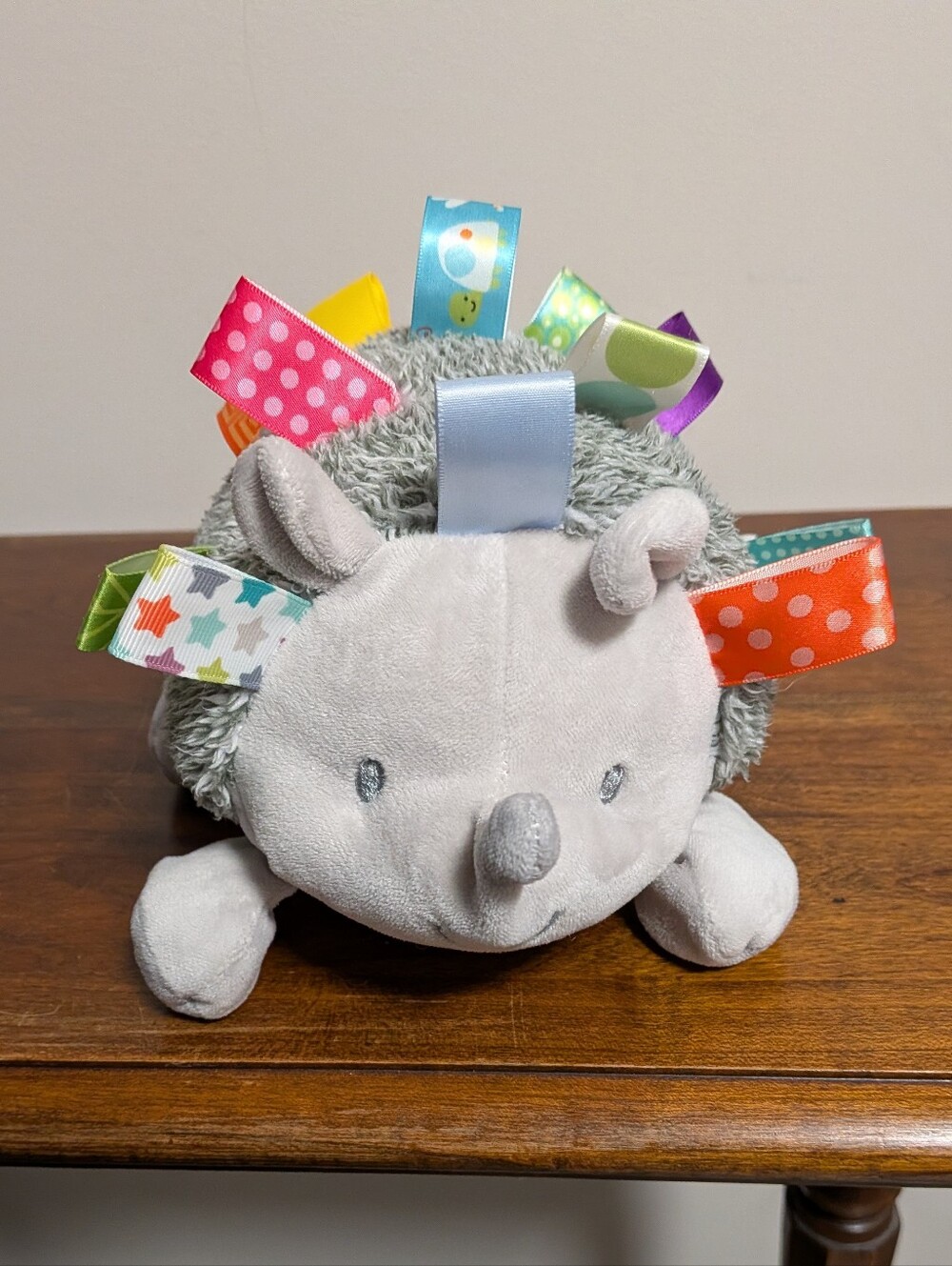 Taggies Mary Meyers.  Gray Hedgehog Plush with Colorful Ribbon